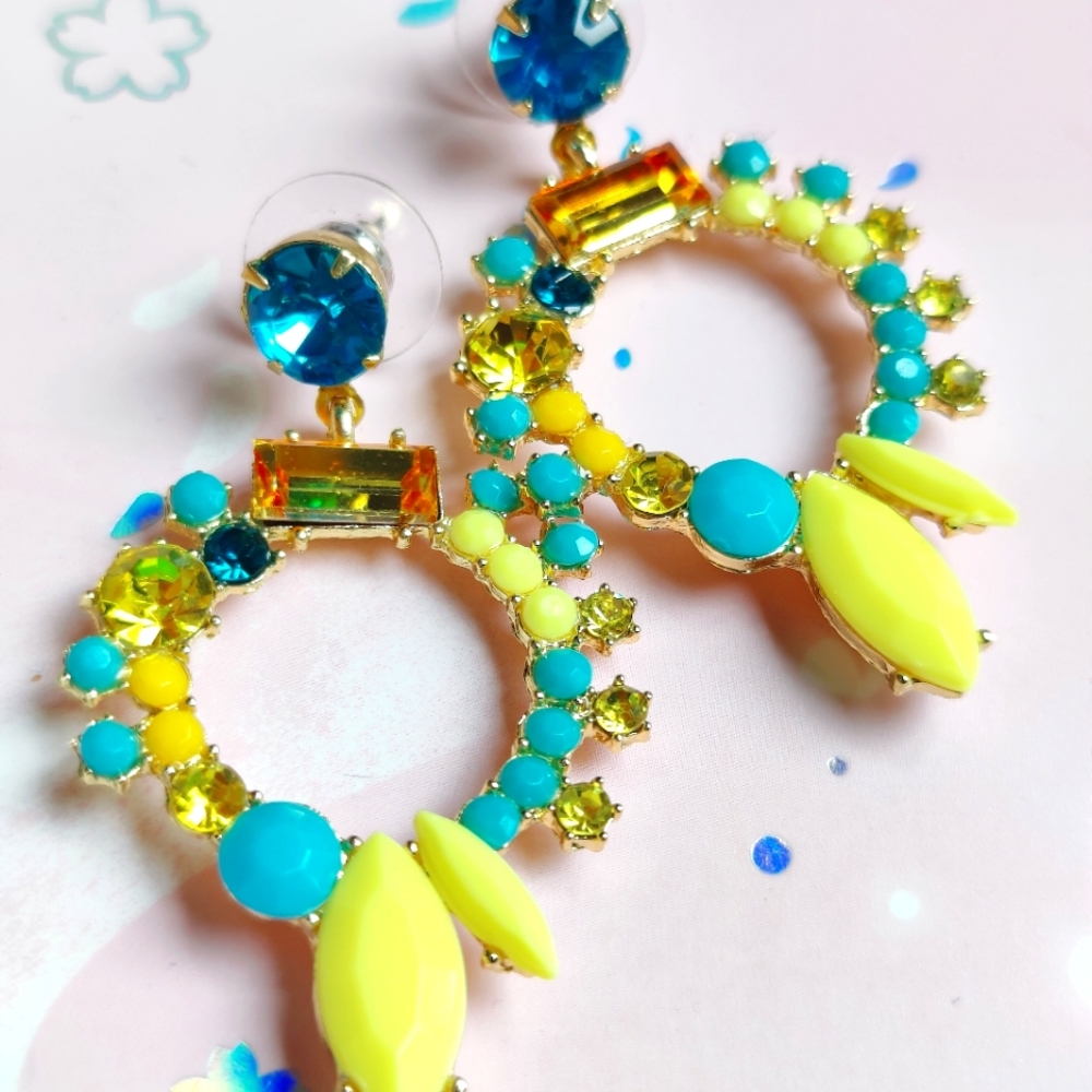 yello/green round shaped earrings